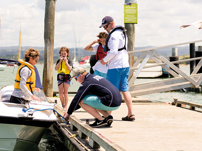 a family getting ready for a day out on the water